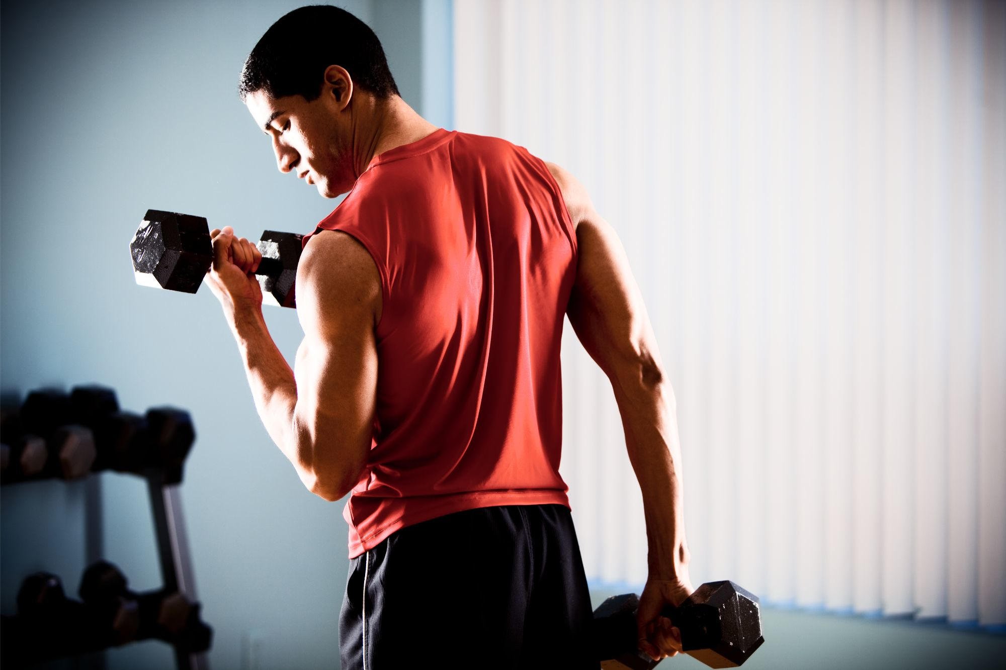 Man Exercising Lifting Weights