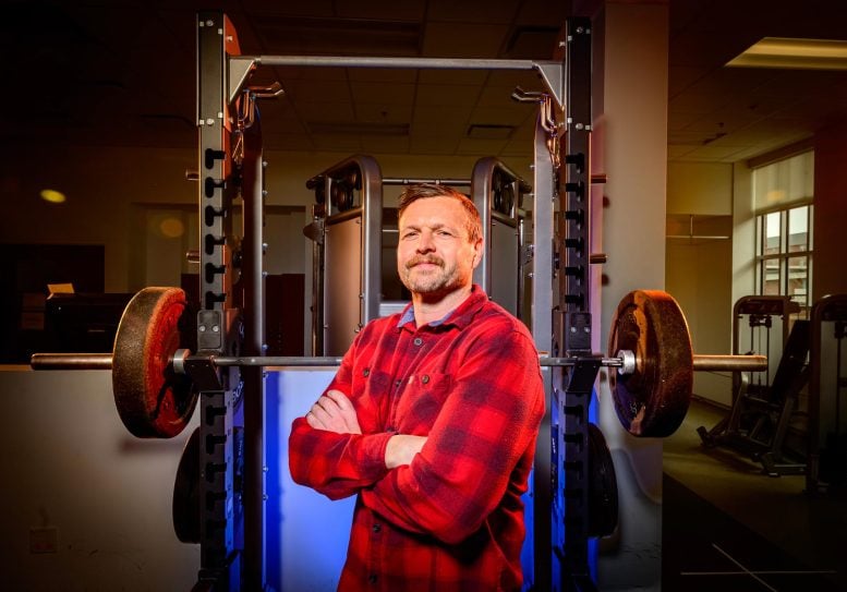 Nicholas Burd Stands in Front of a Weight Rack 777x543 1