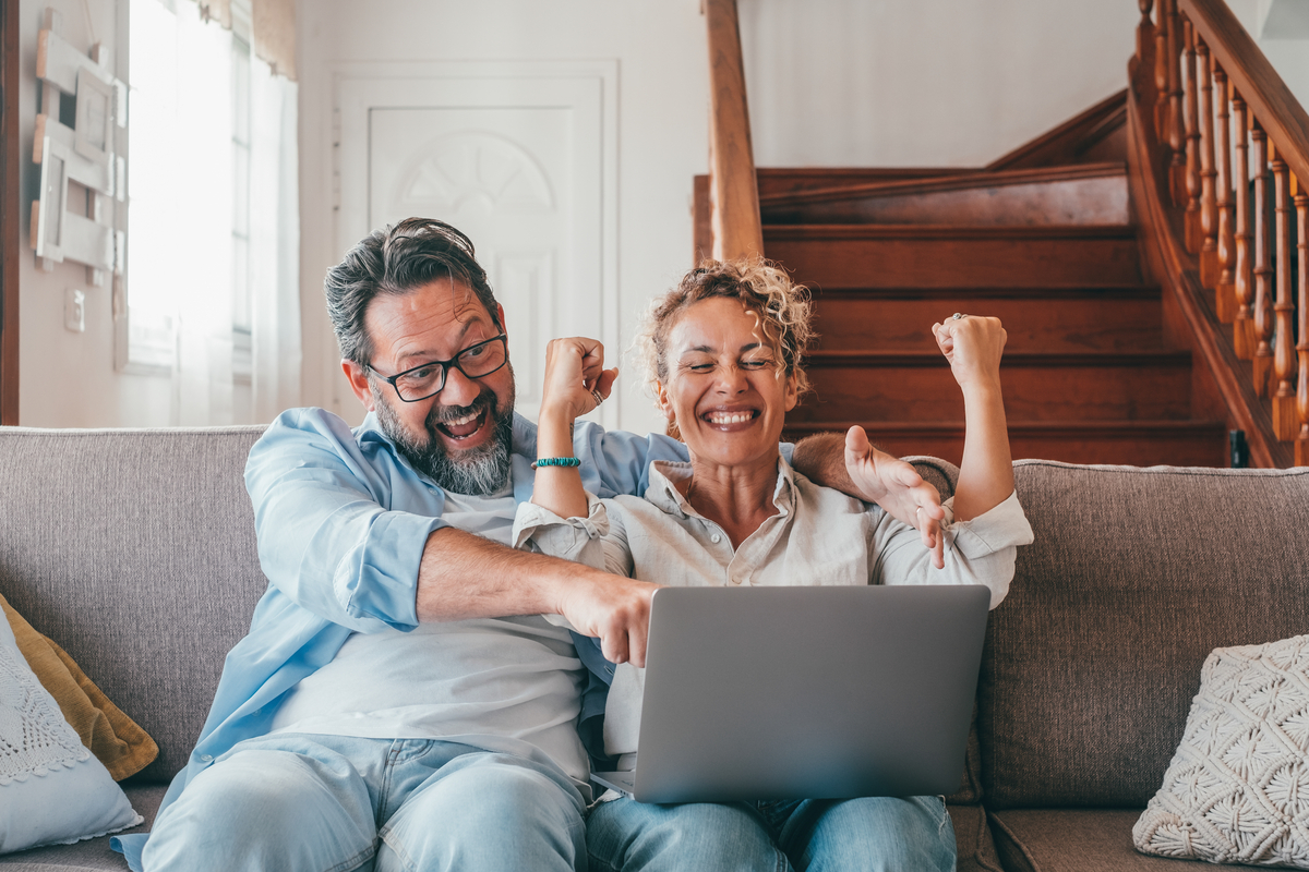 2 people excited with a computer