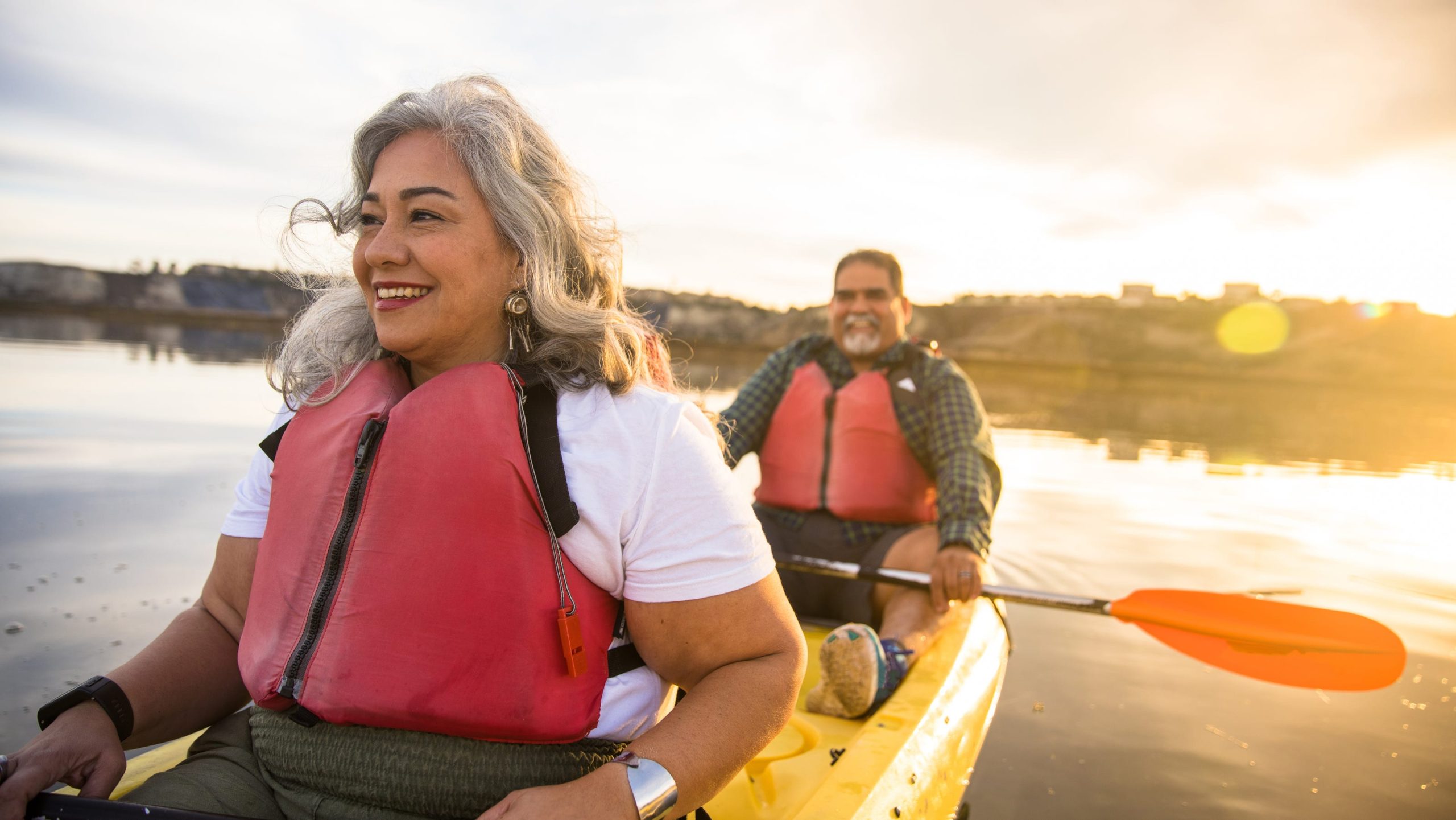 84272159007 senior couple kayak gettyimages 1452776340 scaled
