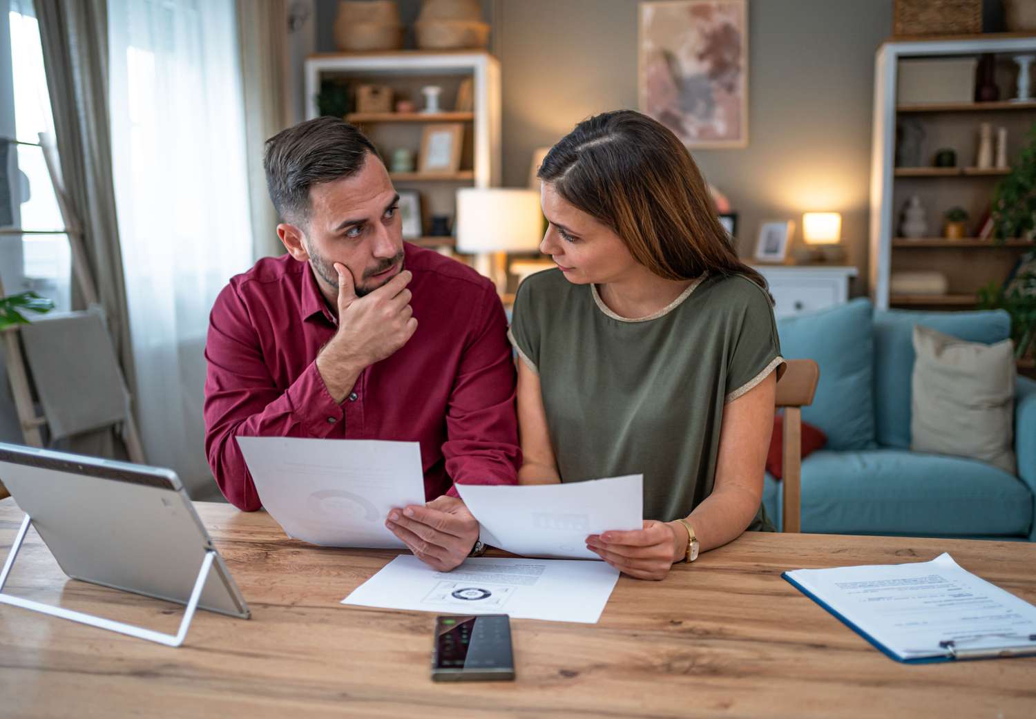 INV PeopleDoingPaperworkatHome GettyImages 2196594698 389f4f996bbb4cb8ba2596c8979cf4b7