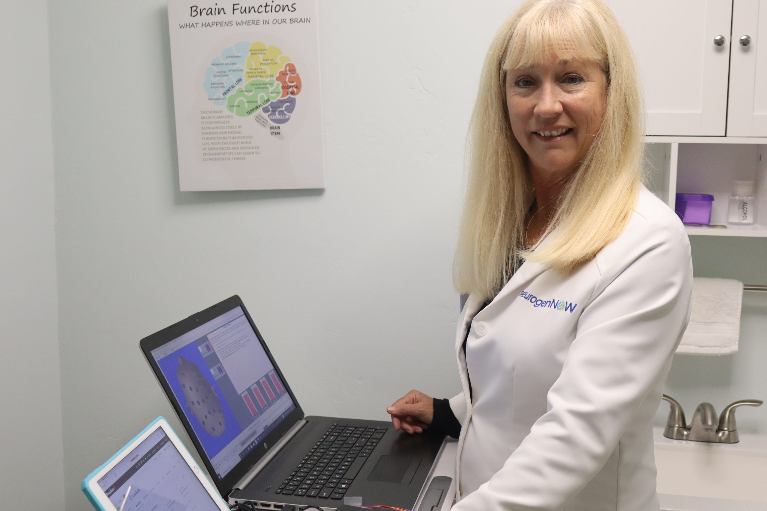 Neurofeedback practitioner Shawna Joy Scott in her suite at Peak Performance Holistic Therapies at 4732 Point Loma Ave. in Ocean Beach scaled 1