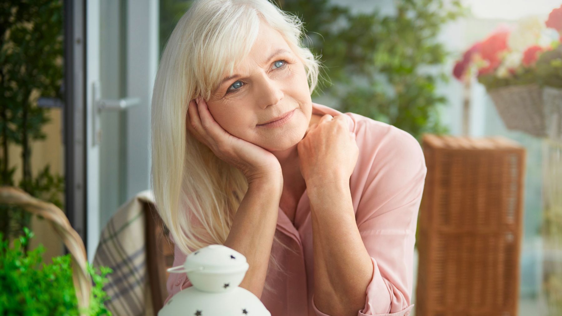 Senior lady in a balcony