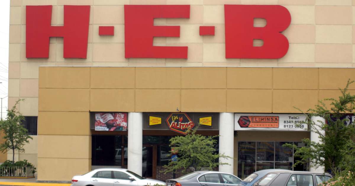 the chains logo hangs over the entrance to an h e b superma