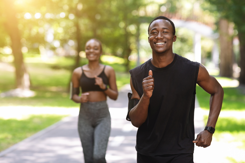 Black couple running shutterstock 1797312526