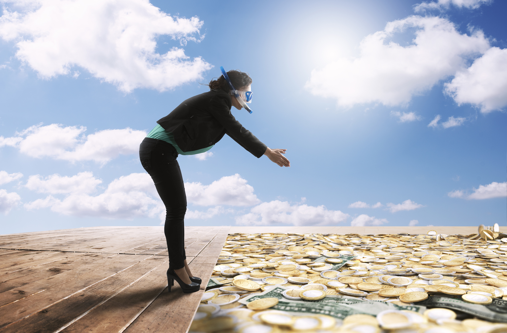 diving into a pool of gold coins