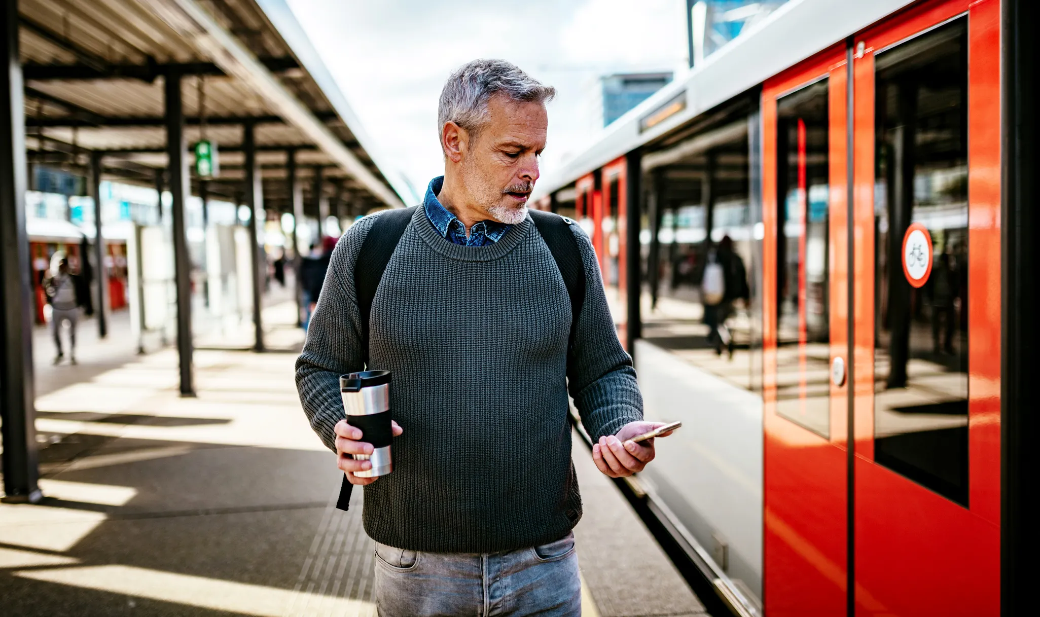 older man commuting