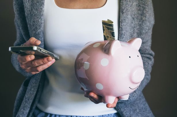 0 Financial planning and savings concept with piggy bank and digital banking