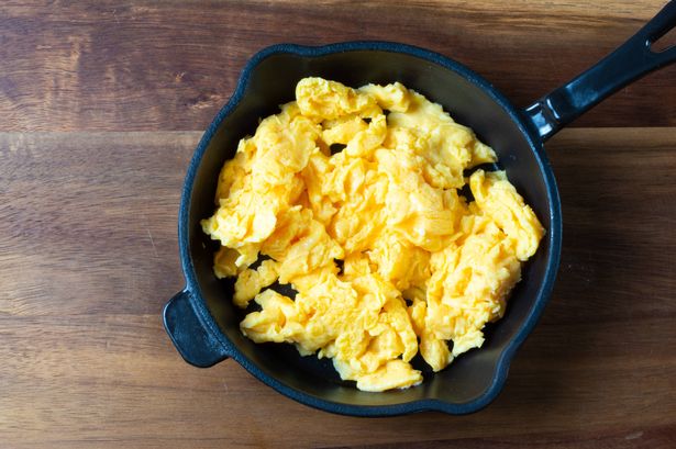 0 Scrambled eggs in a frying pan