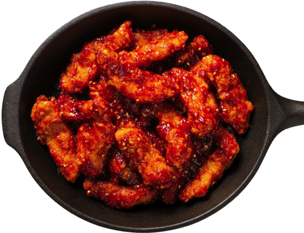 Crispy spicy chicken strips in a cast iron skillet 1