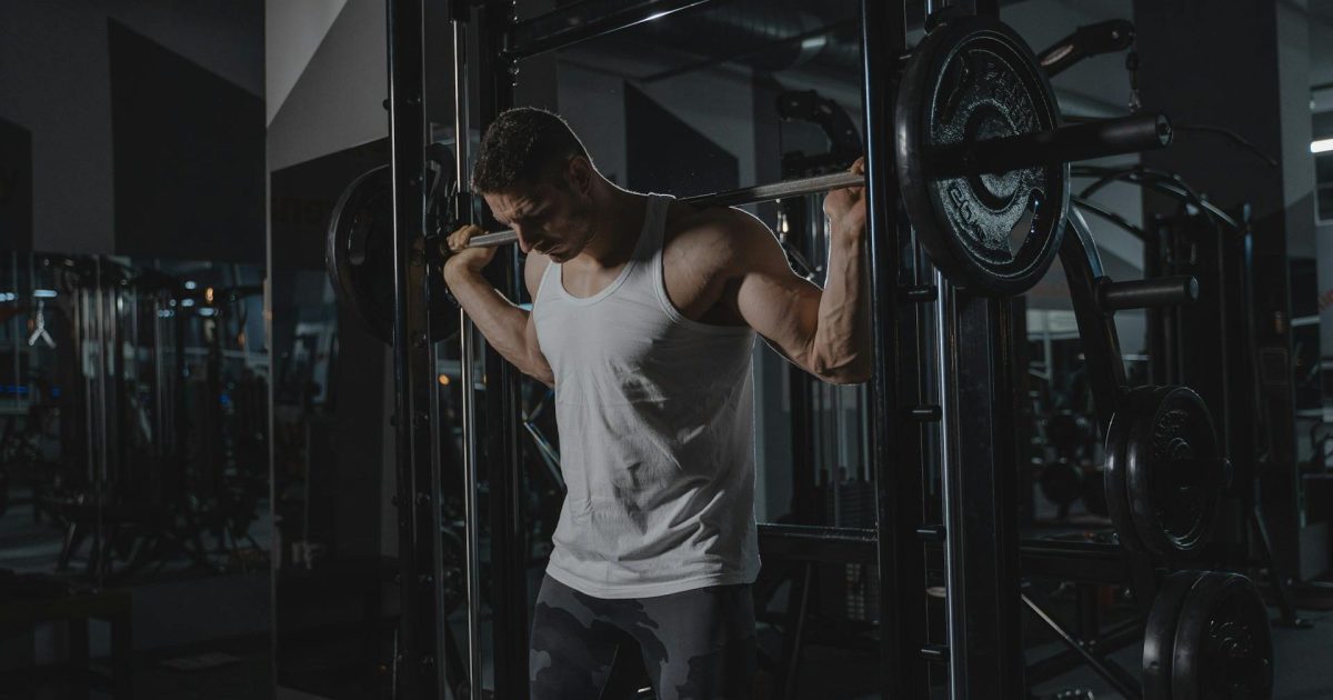 pexels tima miroshnichenko Man barbell gym e1756925454157