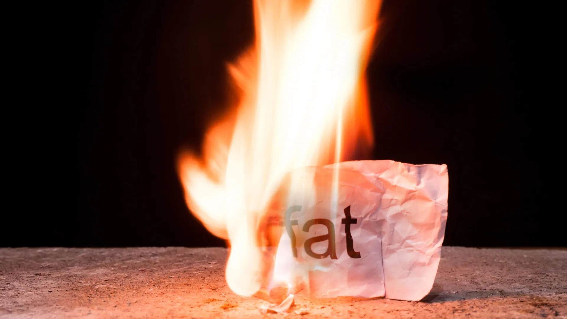 burning fat crumpled paper