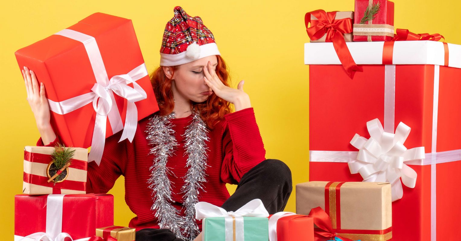front view young woman sitting around xmas presents yellow wall