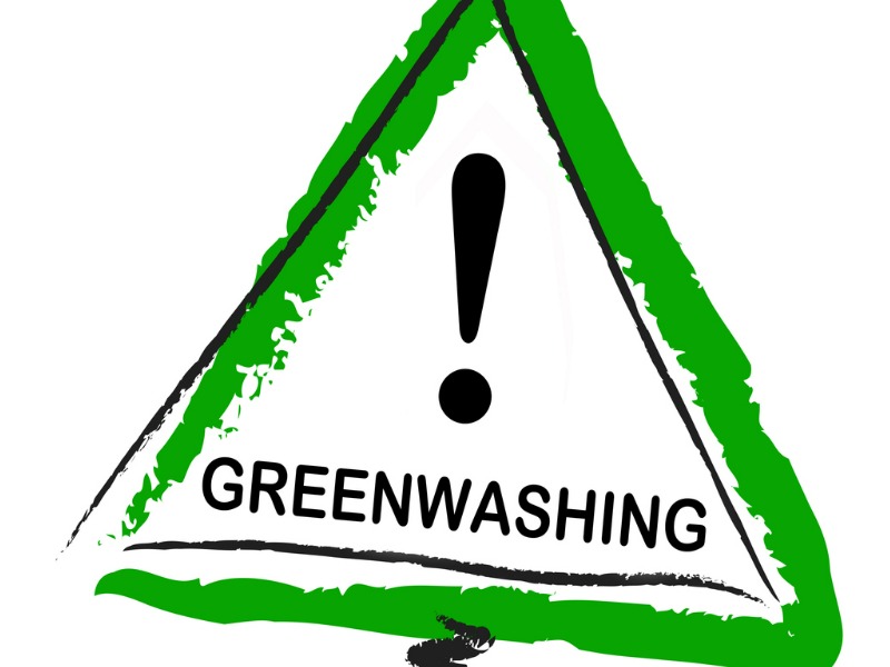 greenwashing and isolated green warning sign against white background illustration id1324900566