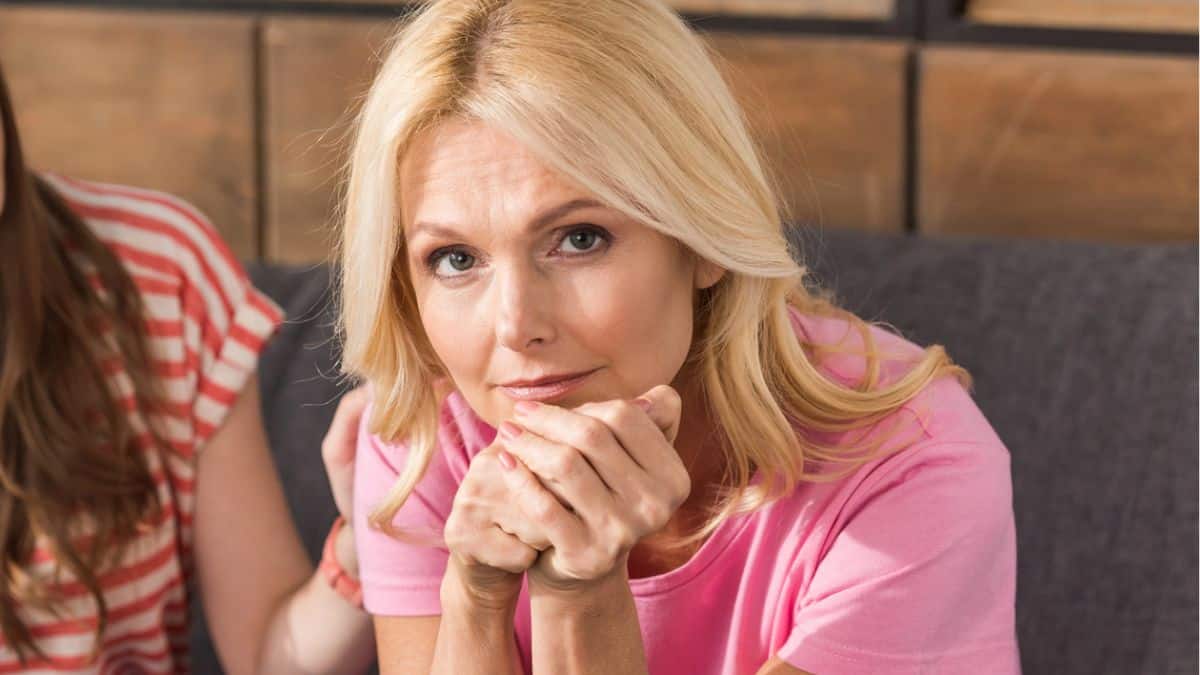 woman sitting disappointed at home