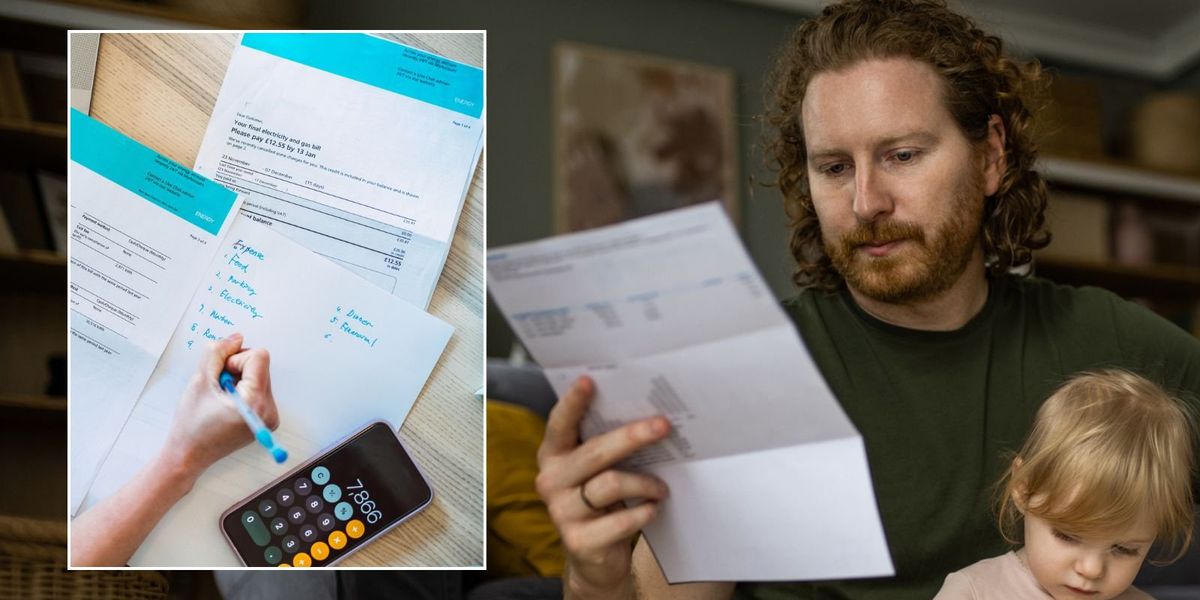 man looking at bill and energy bills