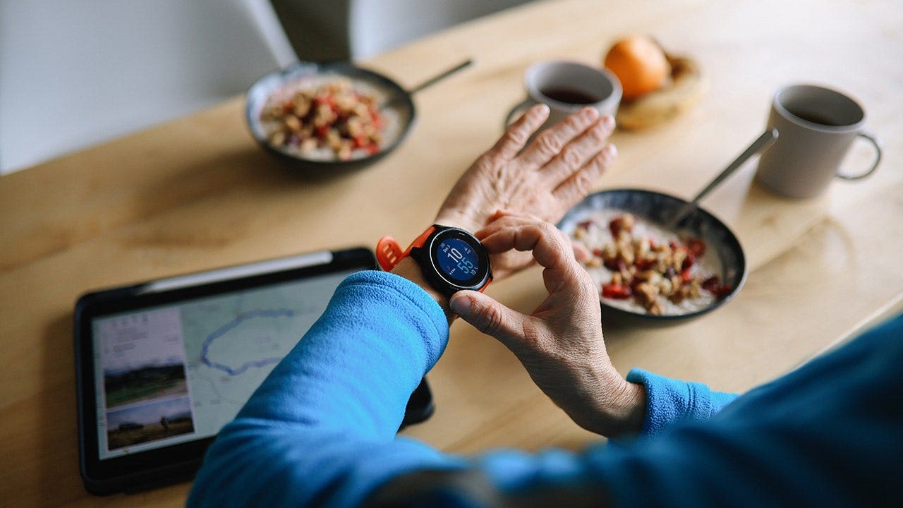 woman using smartwatch outdoors fox news 001