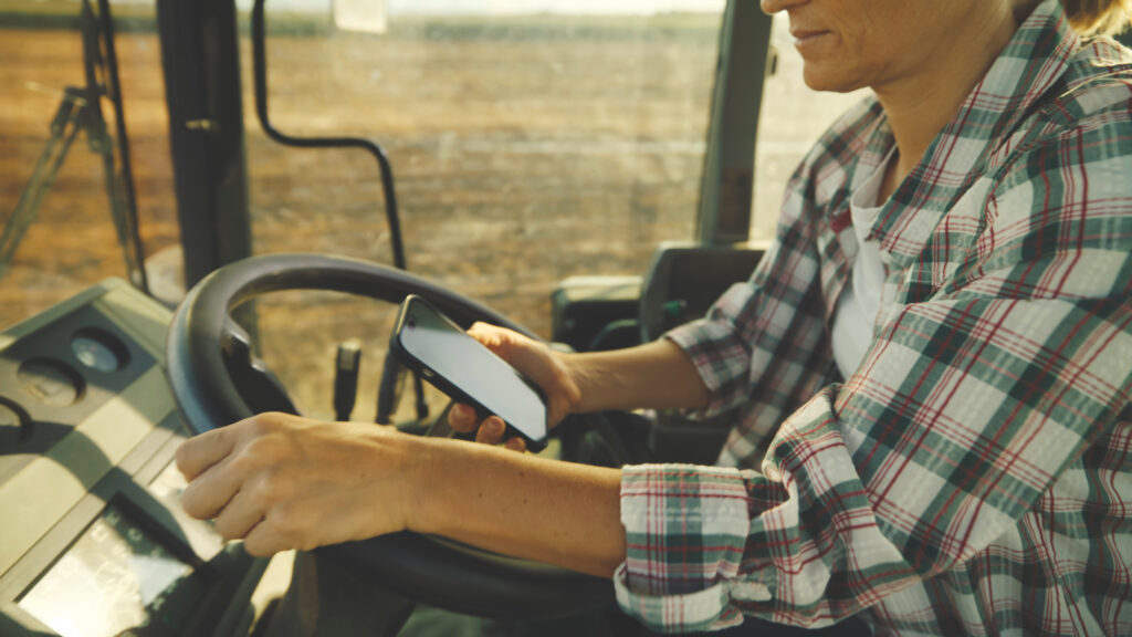 Farmer on mobile phone 2204121873 C SimonSkafar iStockphoto 1024x576 1